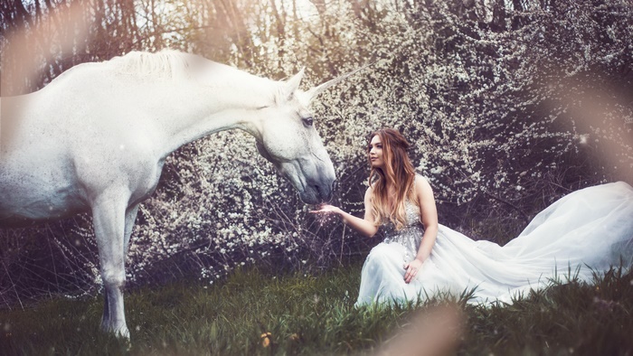 Unicorn and Woman in White Dress