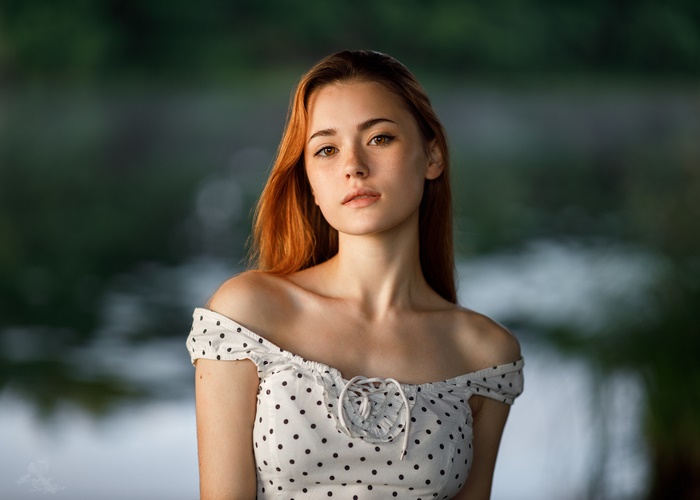 Portrait of Redhead Woman with Polka Dot Dress