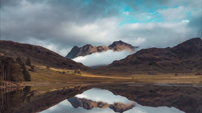 Majestic mountains reflected in a serene lake