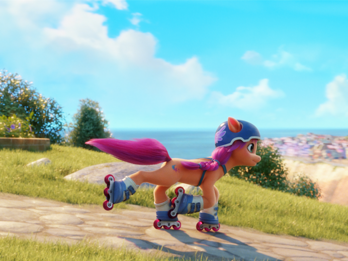 Sunny Starscout roller skating with ocean view