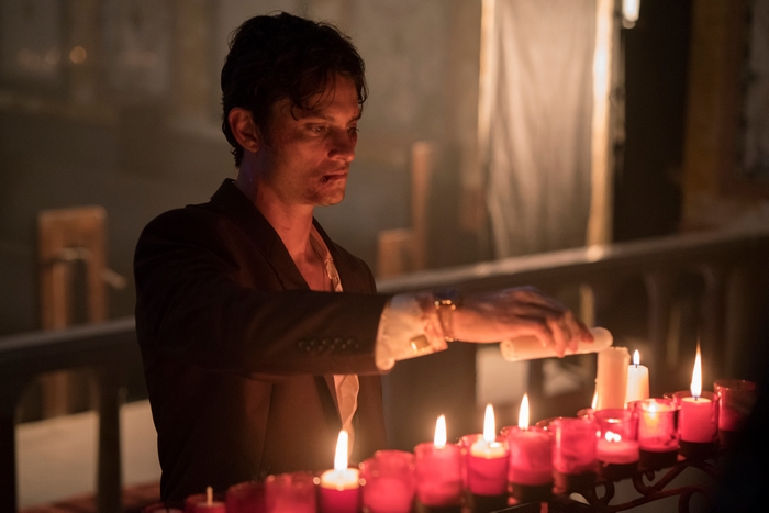Shiloh Fernandez lighting candles in The Birthday Cake