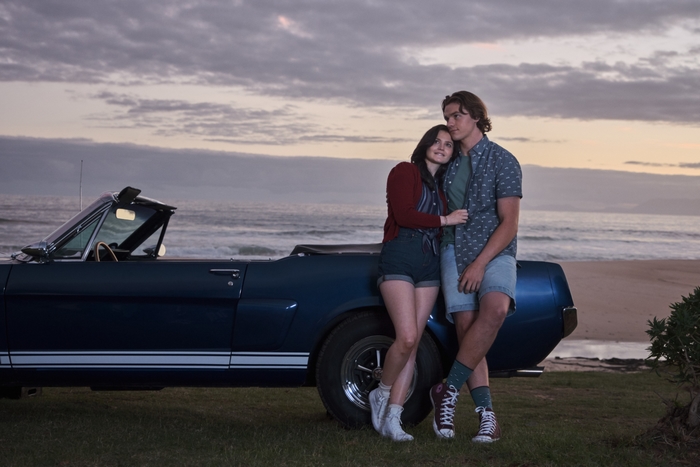 The Kissing Booth 3: Couple with car at sunset beach