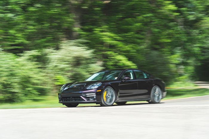 2021 Purple Porsche Panamera Turbo S in motion