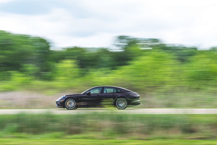 2021 Purple Porsche Panamera Turbo S driving