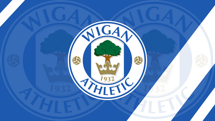 Wigan Athletic F.C. Logo on Blue Patterned Background