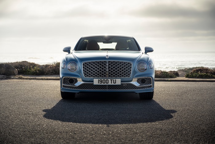 Bentley Flying Spur Mulliner luxury car by the ocean