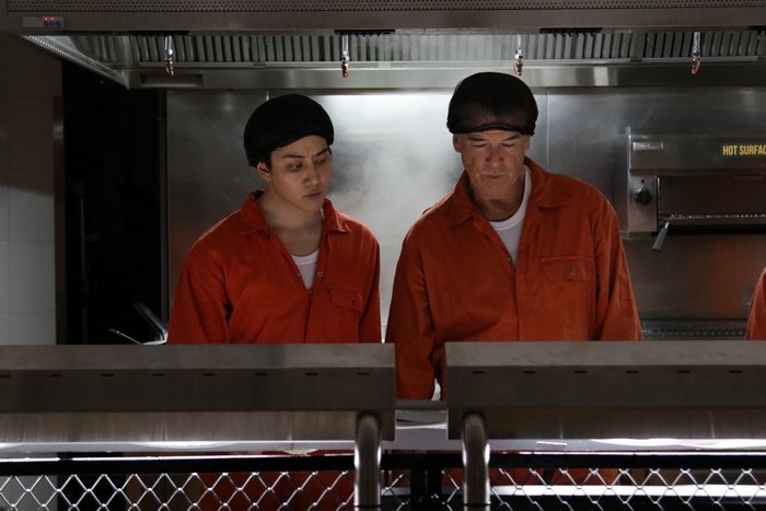 The Misfits: Mike Angelo and Pierce Brosnan in prison kitchen