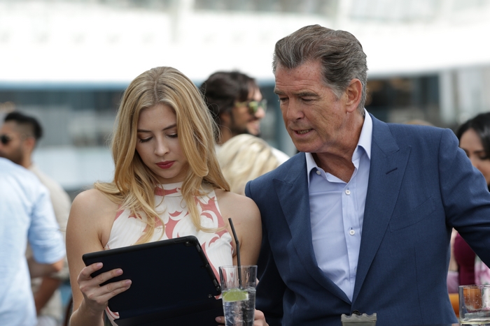 The Misfits: Pierce Brosnan and Hermione Corfield with tablet