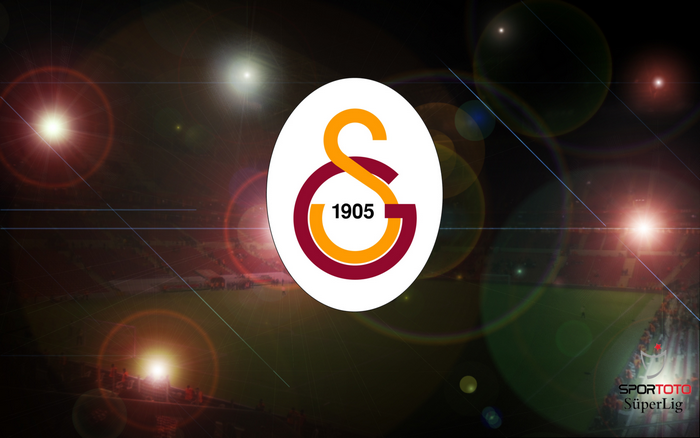 Galatasaray S.K. Emblem over Soccer Stadium with Flares