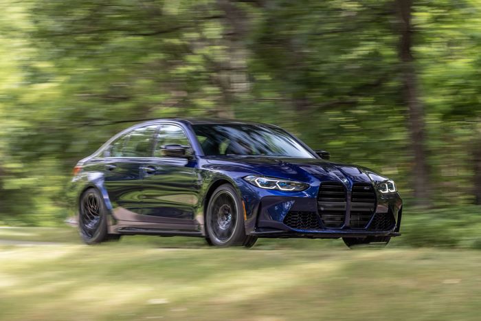 Blue 2021 BMW M3 Competition Luxury Car in Motion