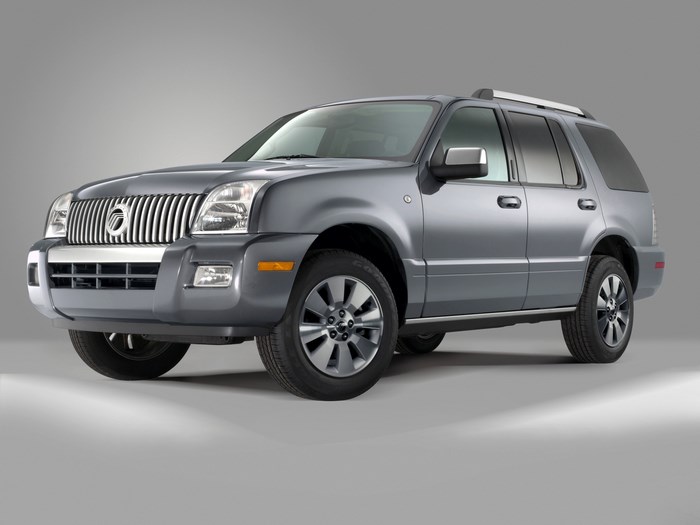 Grey Mercury Mountaineer SUV on a light background