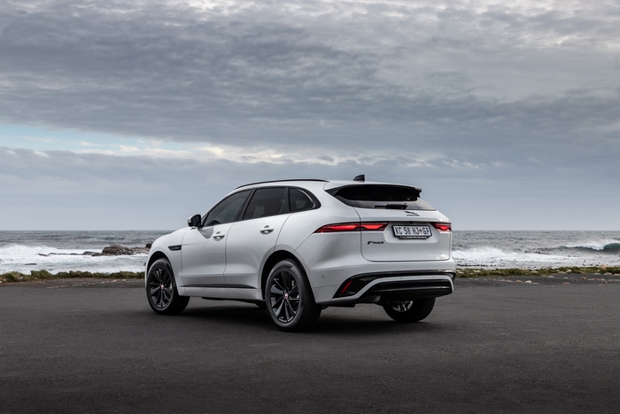 White Jaguar F-Pace luxury SUV by the ocean