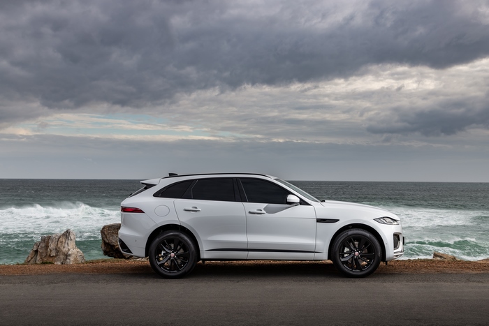 White Jaguar F-Pace SUV parked by the ocean