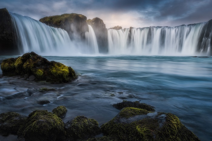 Majestic Waterfall with Silky Water and Mossy Rocks