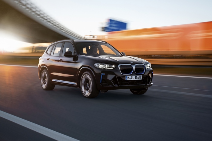 Black BMW iX3 M Sport Electric SUV in motion