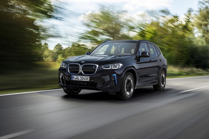 Black BMW iX3 M Sport Electric SUV in motion
