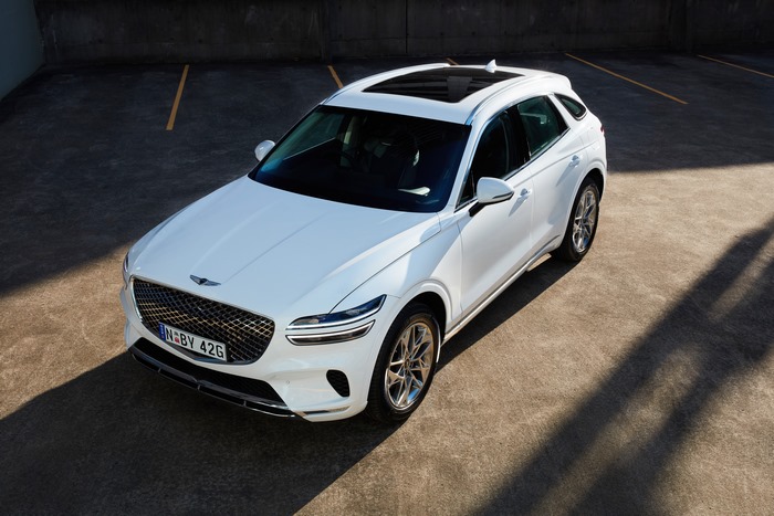 White Genesis GV70 2.5T SUV parked from above
