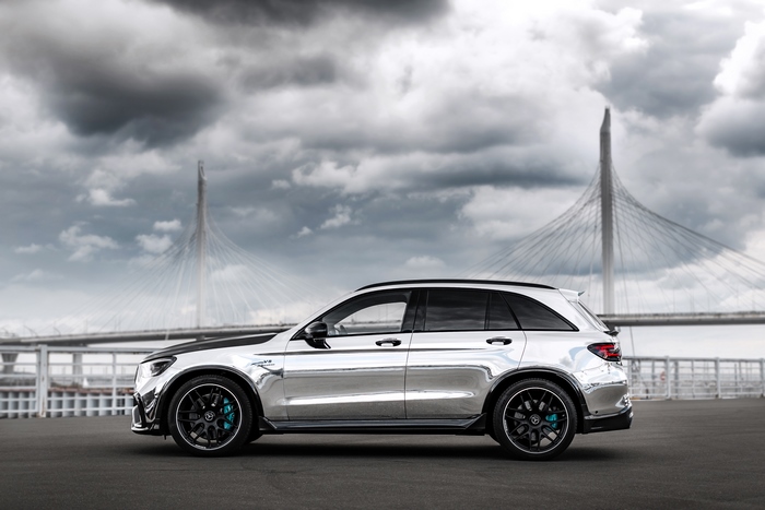 Chrome Mercedes-AMG GLC-Klasse SUV under dramatic sky