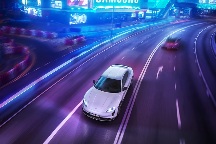 TechArt Porsche Taycan Aerokit on Neon City Road