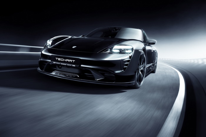TechArt Porsche Taycan Aerokit: Black Sport Car in Motion