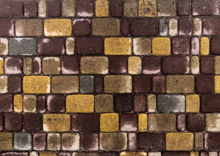 Textured Multicolored Brick Wall Pattern