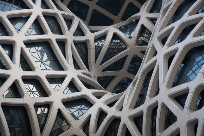 Futuristic Building Facade with Woven Geometric Pattern