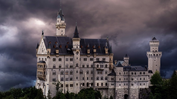 Majestic Neuschwanstein Castle with stormy clouds 4K