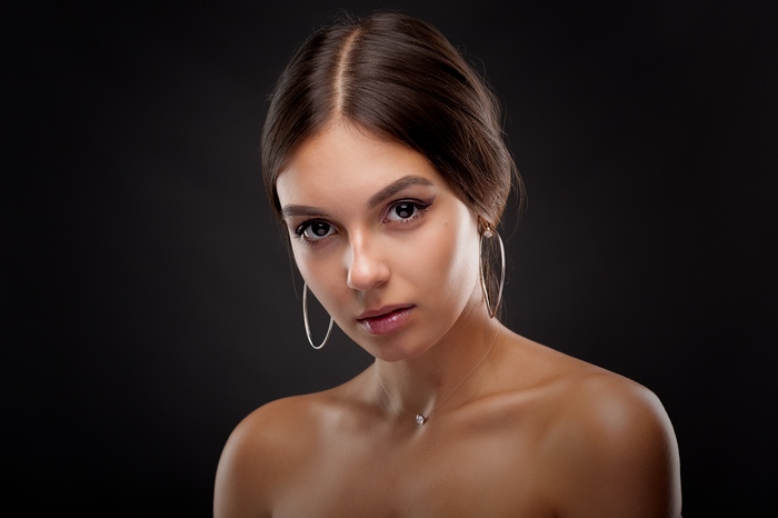 Portrait of a Woman with Hoop Earrings