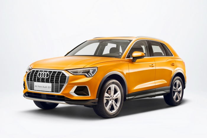Orange Audi Q3 SUV
