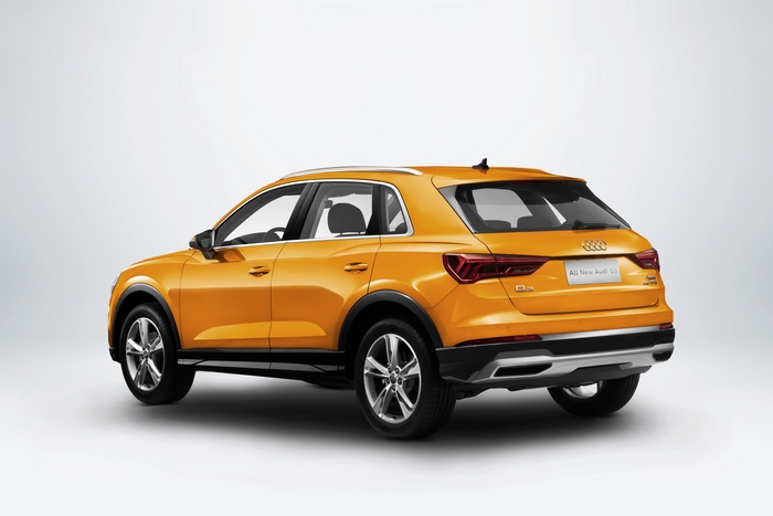 Orange Audi Q3 35 TFSI SUV rear view