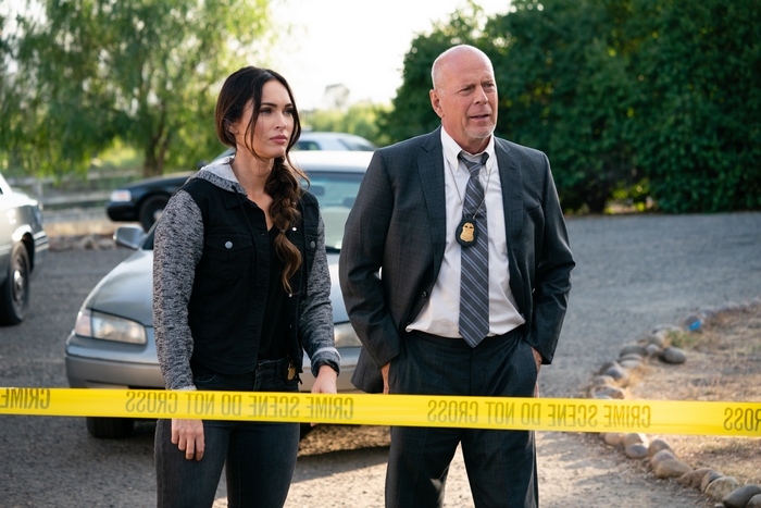 Megan Fox and Bruce Willis as detectives at crime scene