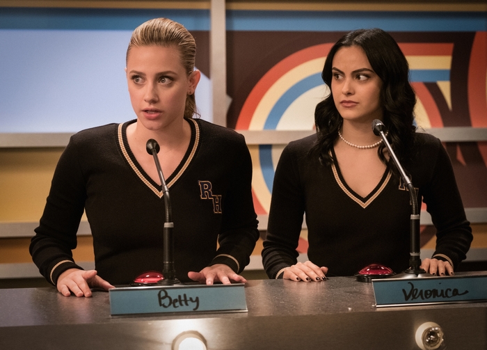 Betty Cooper and Veronica Lodge competing in a quiz