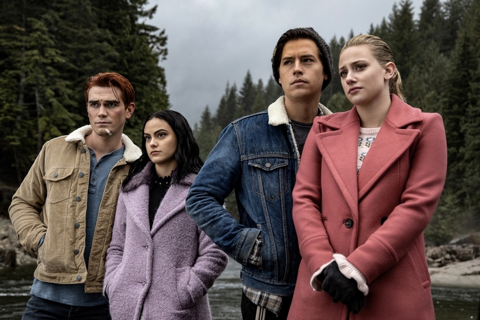 Archie, Veronica, Jughead, and Betty from Riverdale outdoors