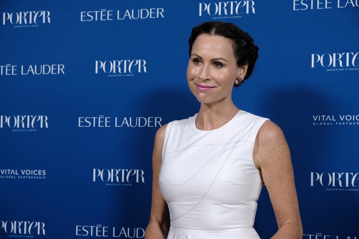 Minnie Driver smiling at Estée Lauder event