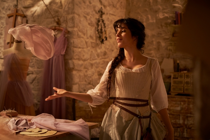 Camila Cabello as Cinderella creating a dress