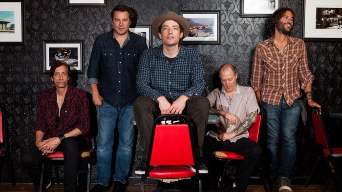 The Wallflowers band members posing