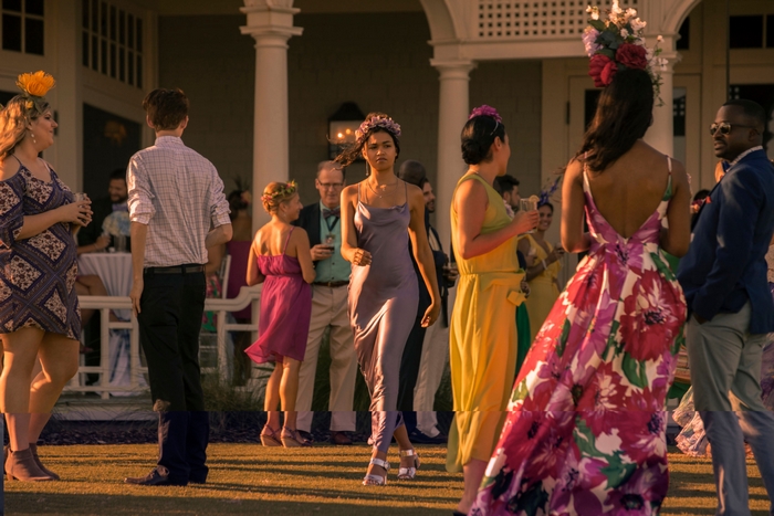 Madison Bailey in a lavender dress at a garden party