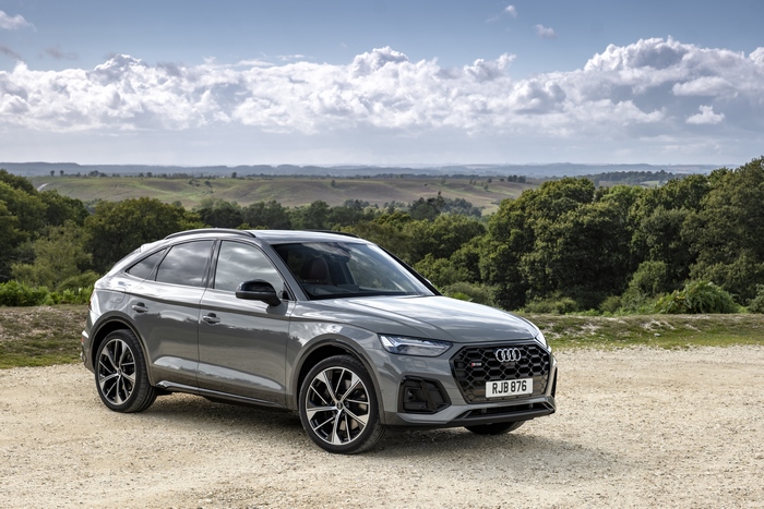 Grey Audi SQ5 Sportback SUV parked in a scenic landscape