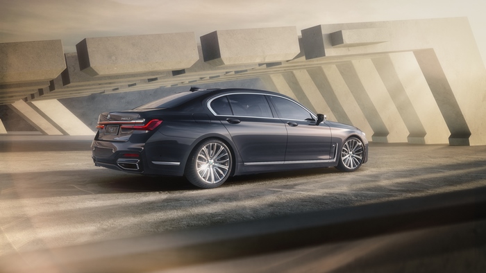 BMW 740Li M Sport Individual luxury sedan in modern architecture