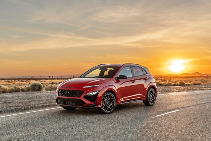 Red 2022 Hyundai Kona N SUV at sunset
