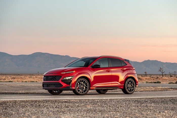 Red 2022 Hyundai Kona N SUV in desert sunset