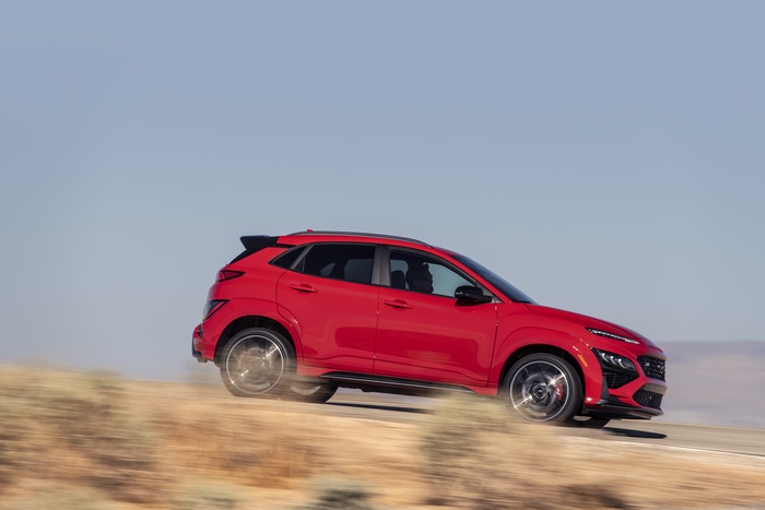 Red Hyundai Kona N SUV in motion