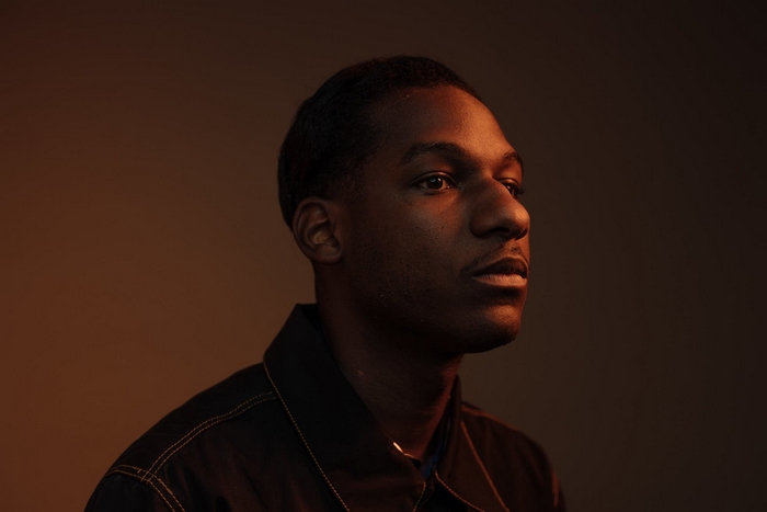 Leon Bridges close-up portrait with warm lighting