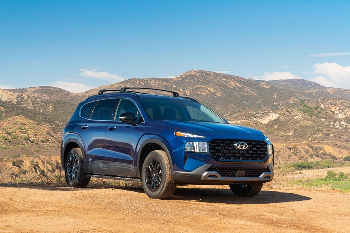 Blue 2022 Hyundai Santa Fe XRT SUV on dirt road