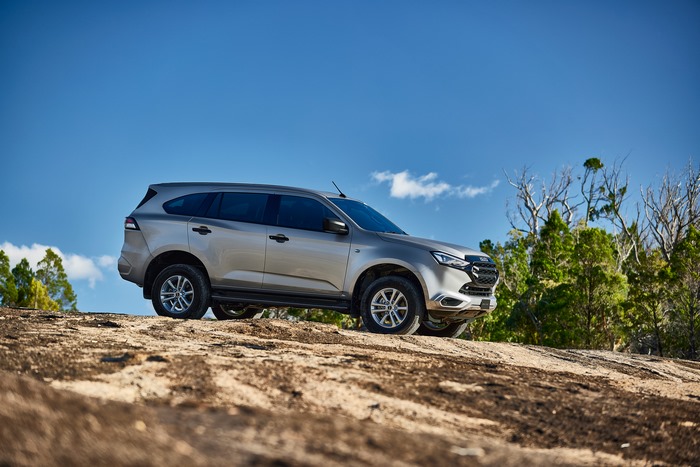 Isuzu MU-X 4x4 SUV on rocky off-road terrain
