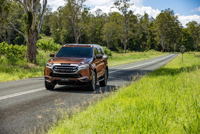 Isuzu MU-X 4x4 LS-U SUV driving on a scenic road