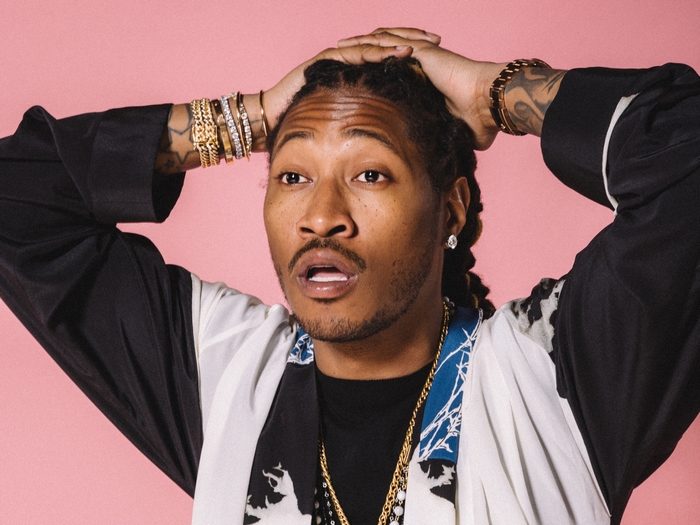 Future Rapper Looking Up Pink Background