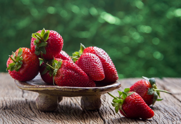 Fresh Strawberries on Rustic Wood