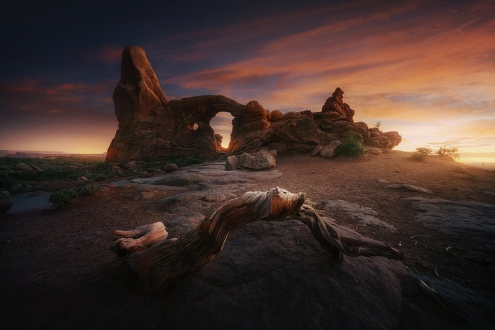 Sunset over desert rock arches