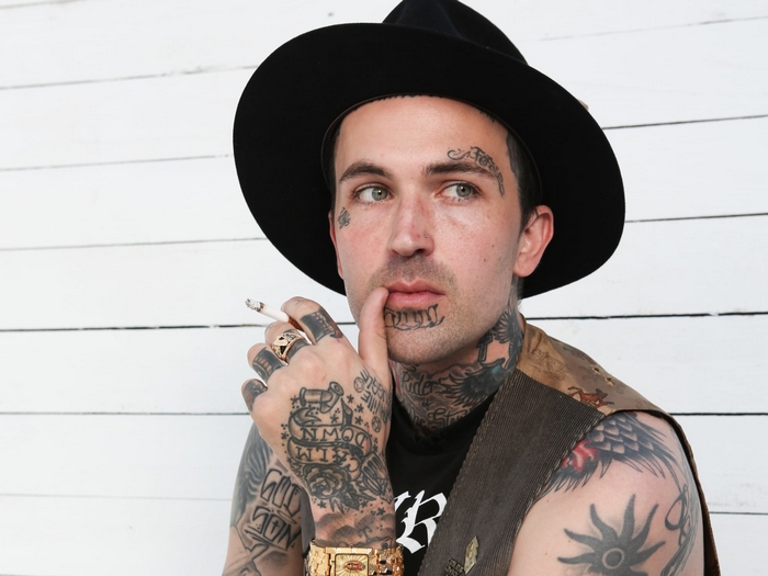 Yelawolf, American Rapper, with Tattoos and Cigarette